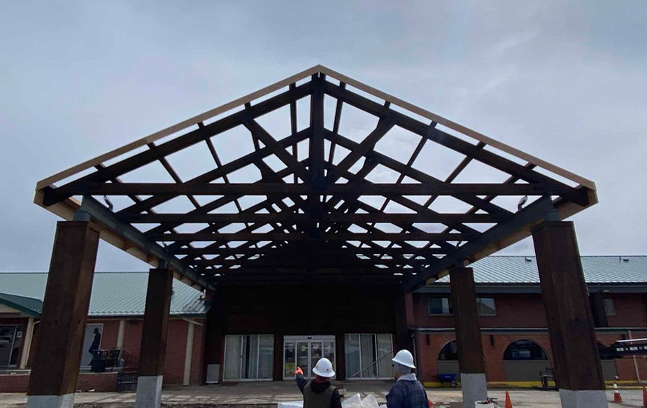 keep hotel PIP on schedule during renovations - pictured: hotel porte cochere remodel