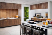 Hilton Garden Inn | Huntsville, AL hotel design trend 2026 wellness breakfast area